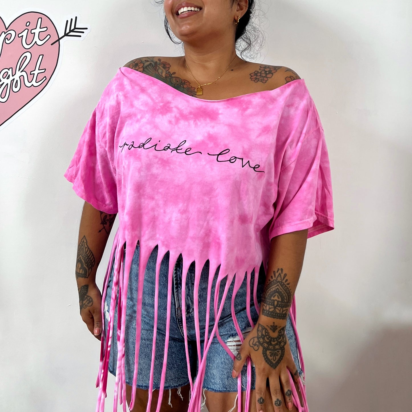 radiate love tie-dye tassel top