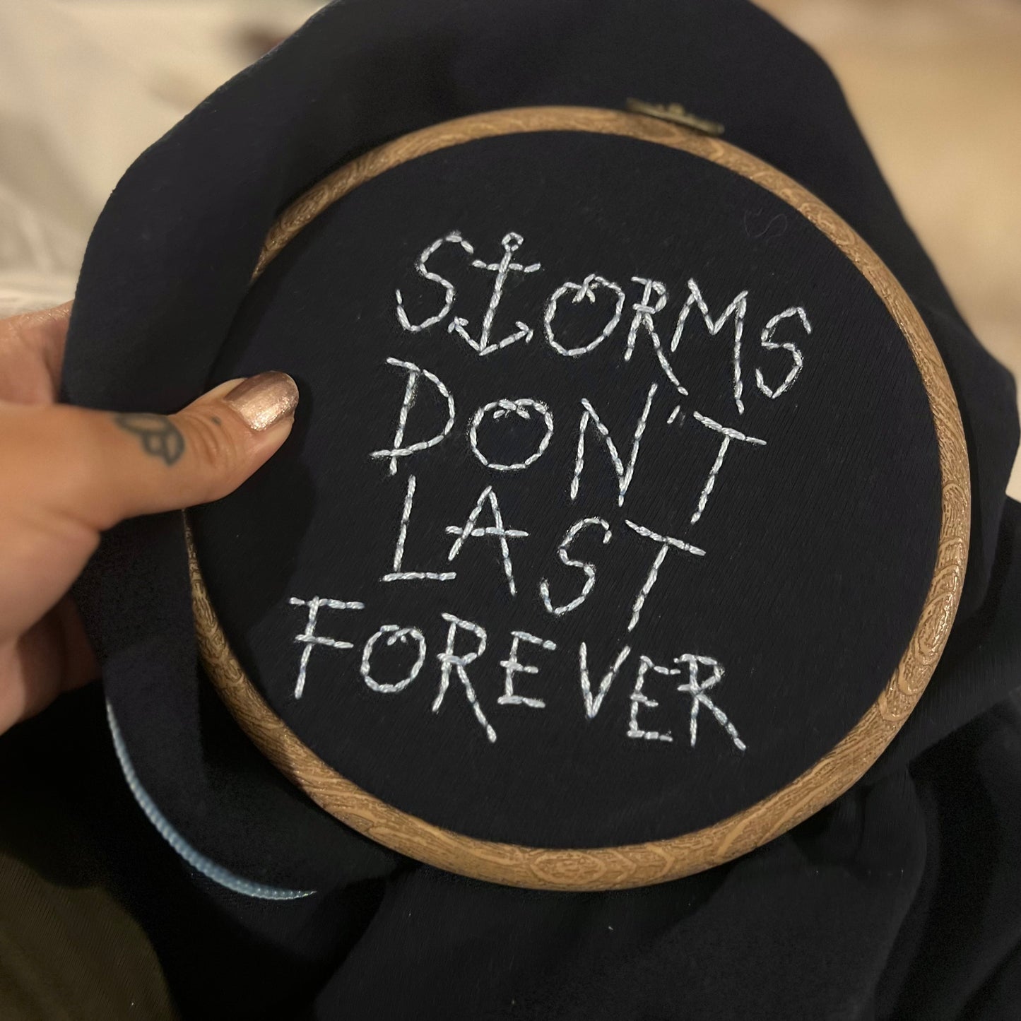 storms don’t last forever embroidered zip-up hoodie