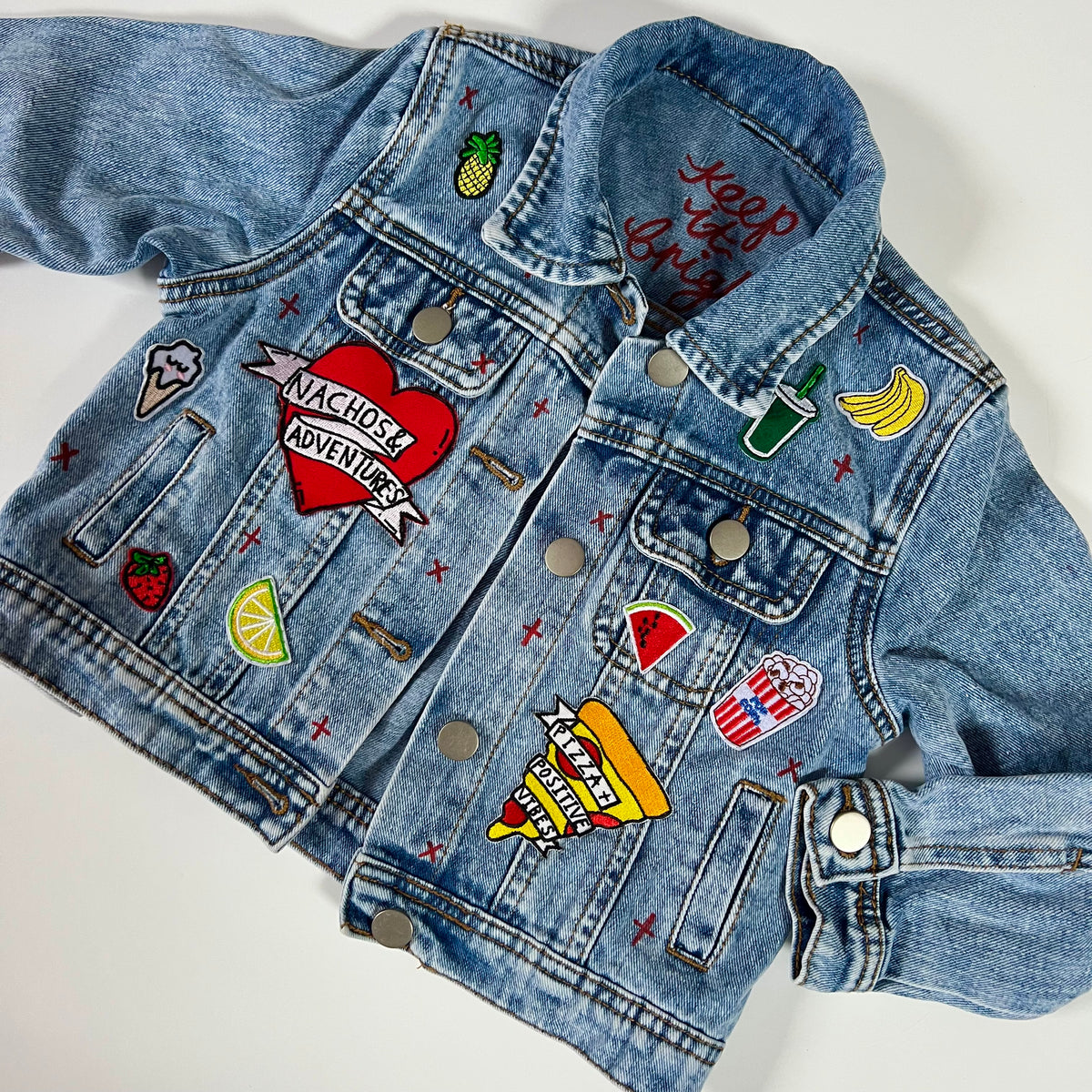 ‘snacks’ kids denim jacket
