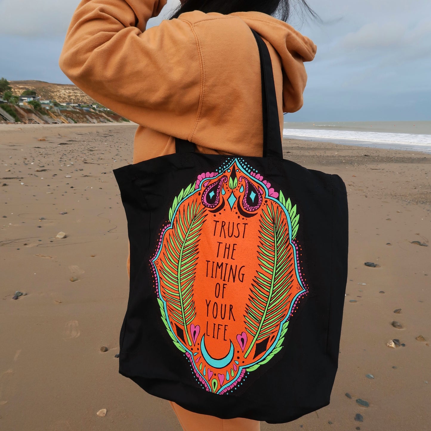 trust the timing of your life tote bag