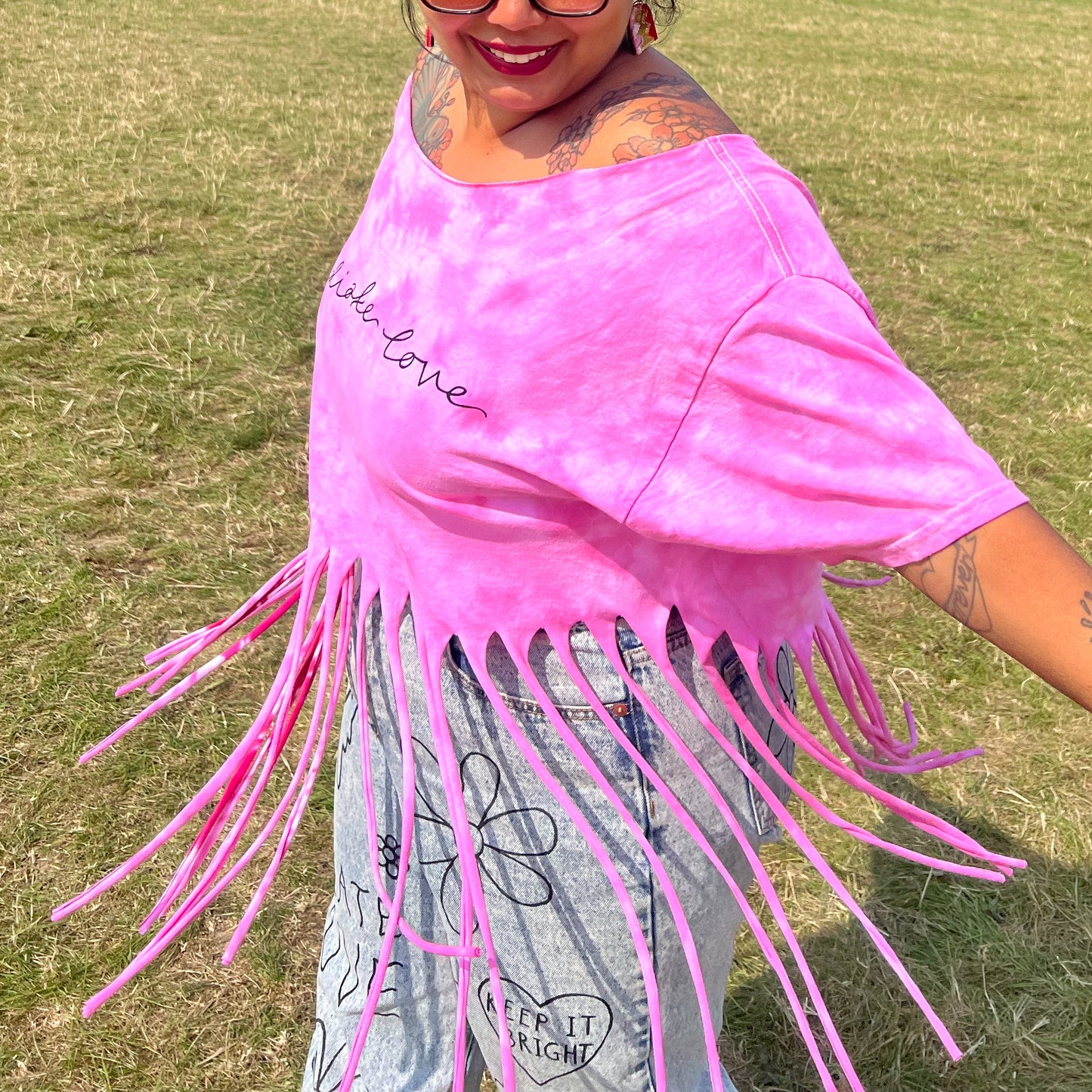 radiate love tie-dye tassel top