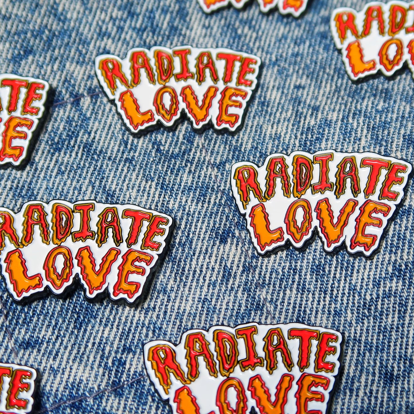 radiate love enamel pin badge