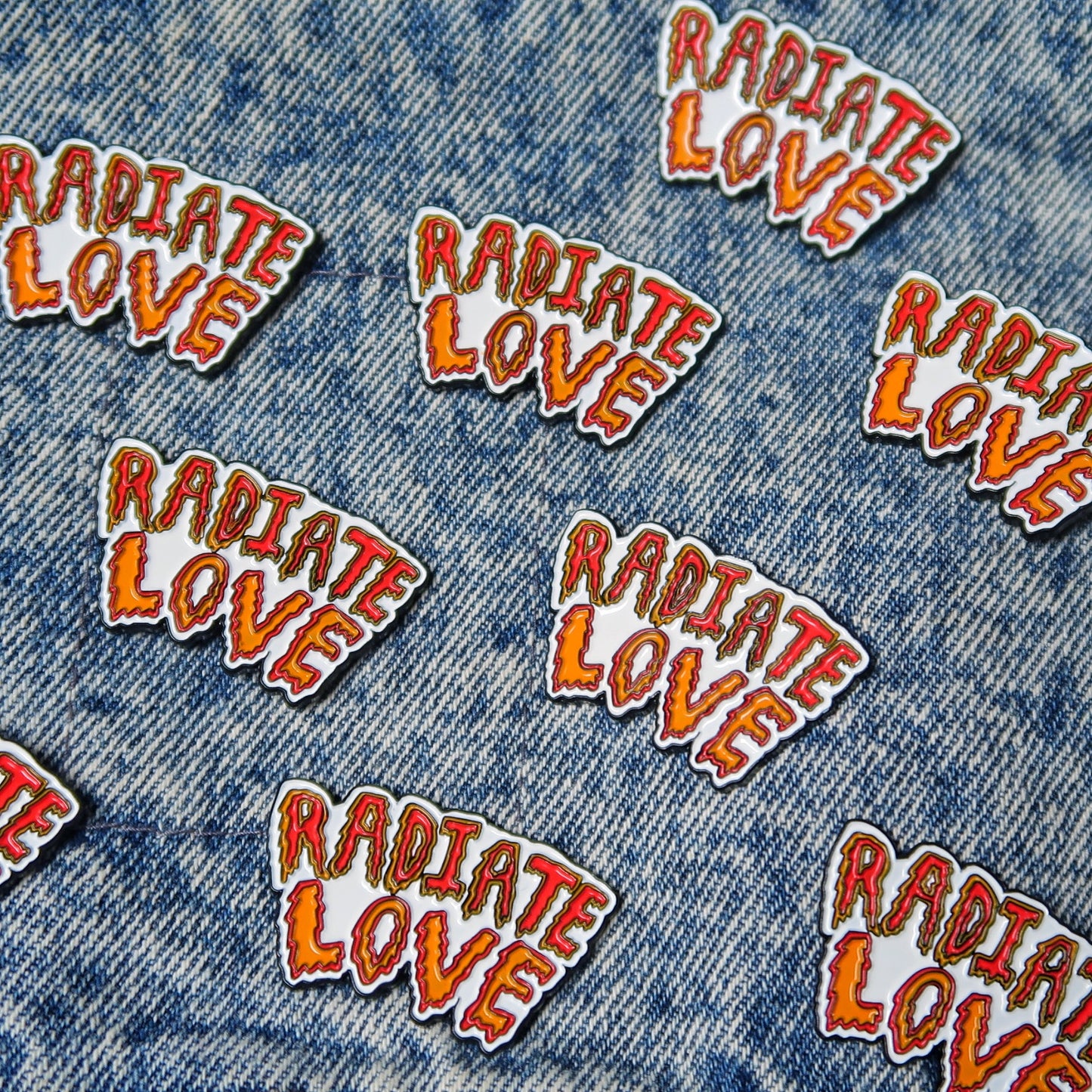 radiate love enamel pin badge