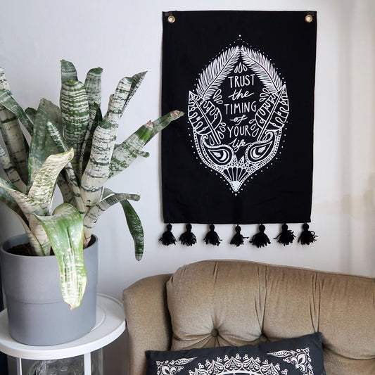 trust the timing of your life wall hanging - black tassels