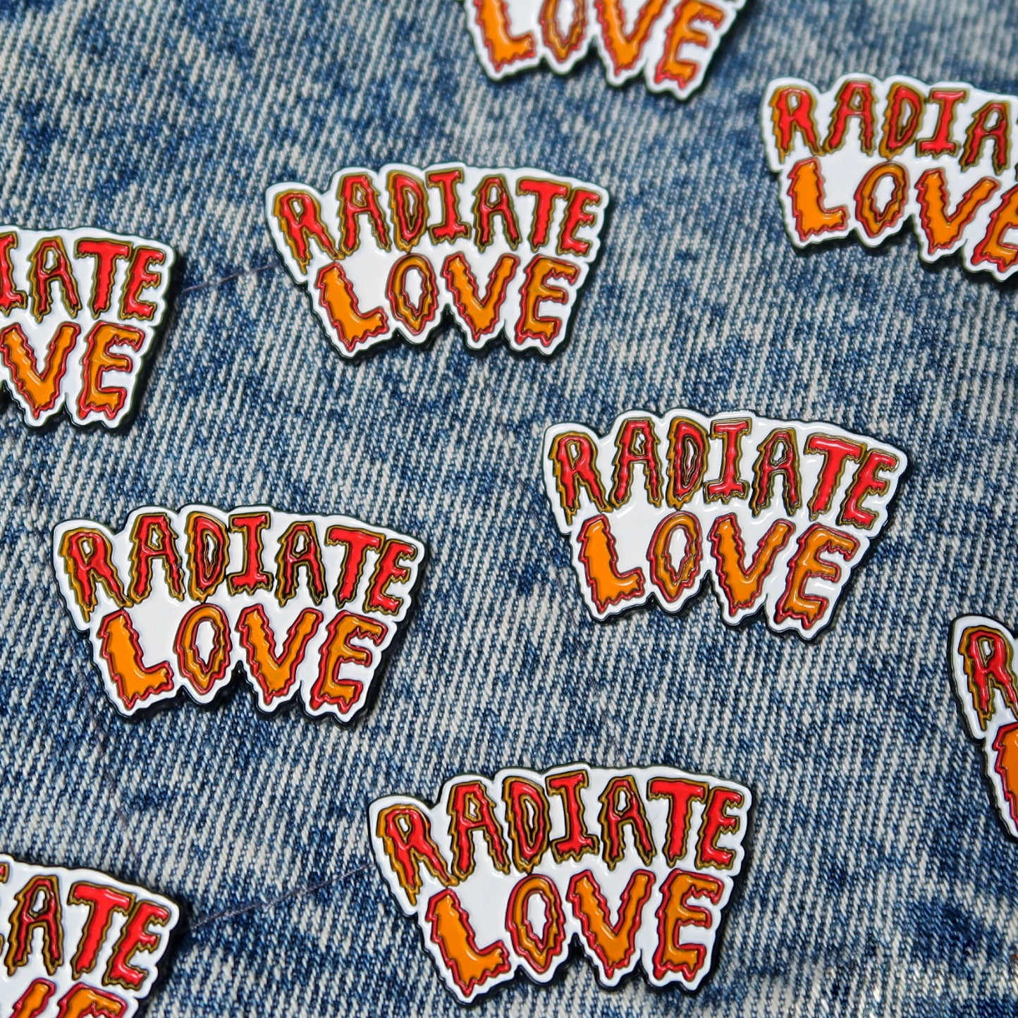 radiate love enamel pin badge