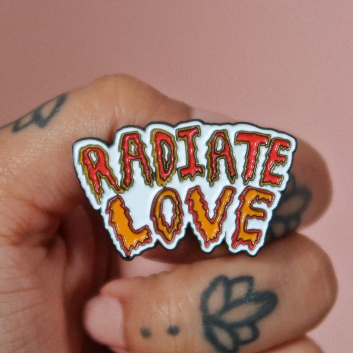 radiate love enamel pin badge