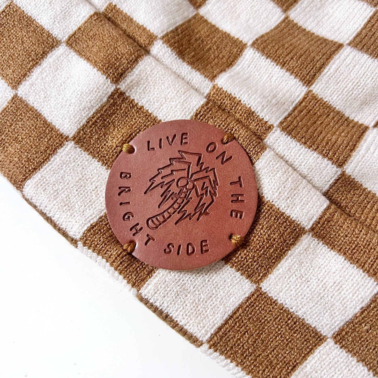 live on the bright side checkerboard beanie