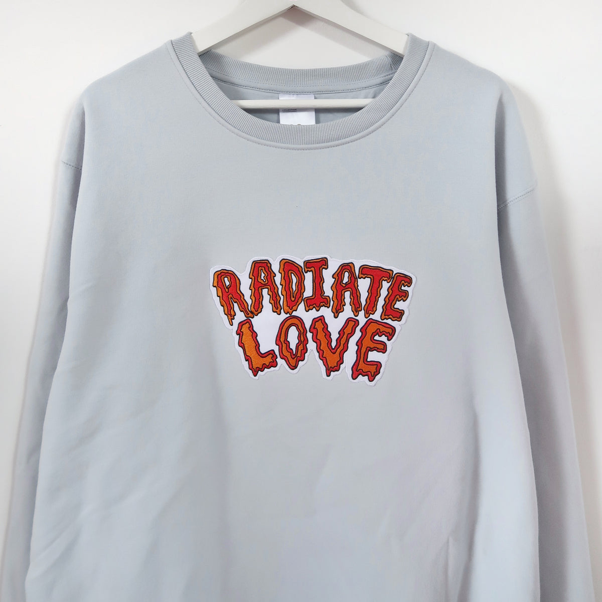 radiate love embroidered sweatshirt - lightest blue