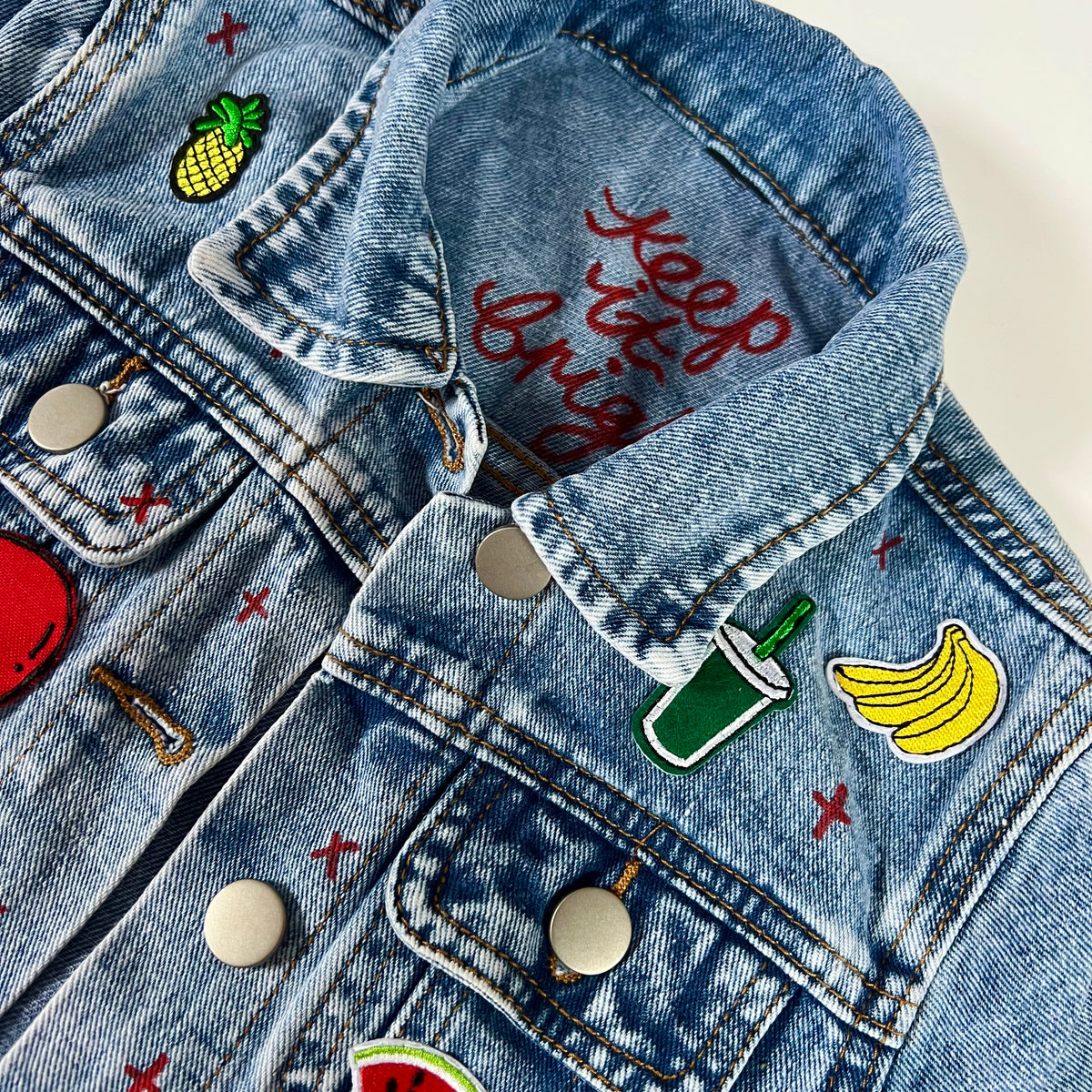 ‘snacks’ kids denim jacket