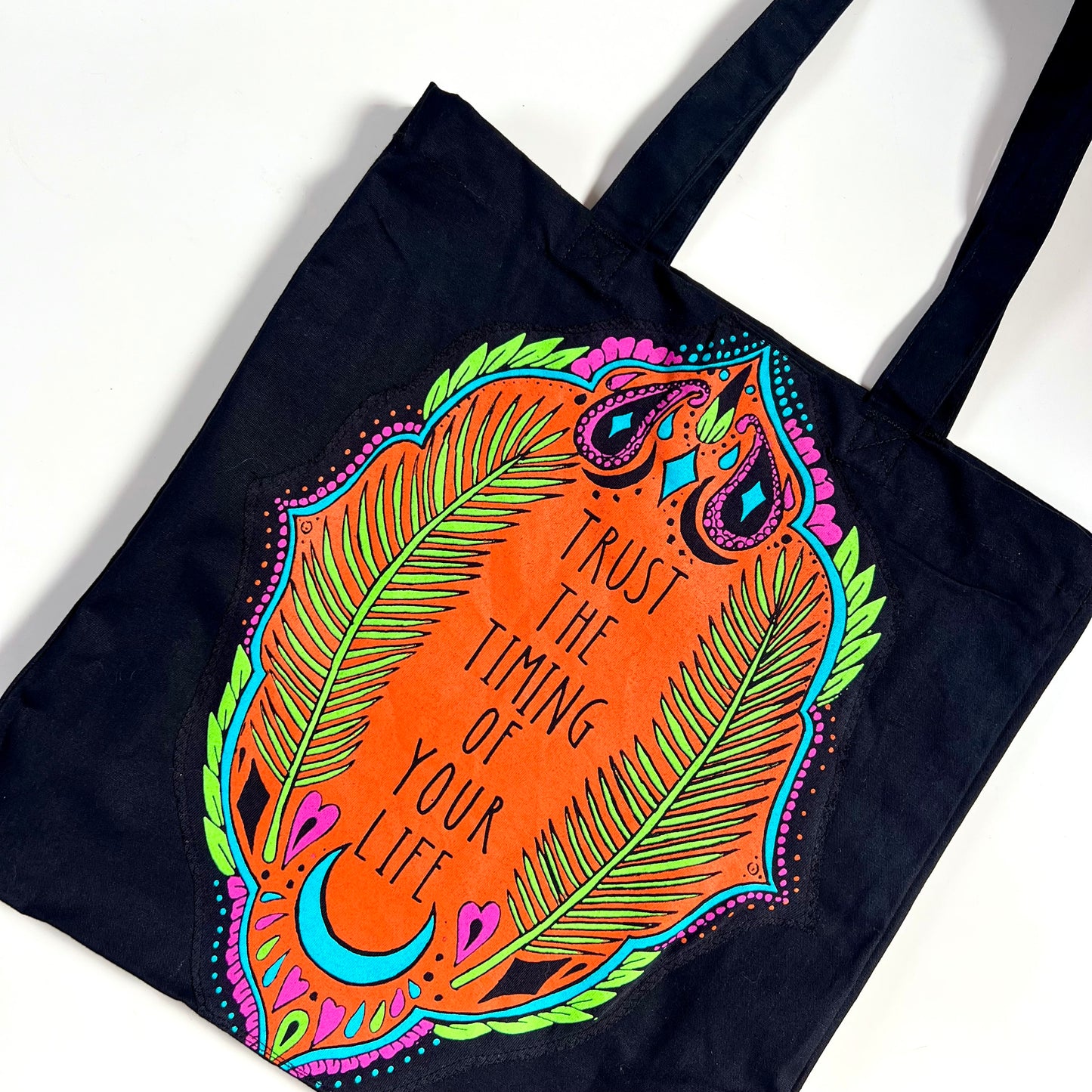 trust the timing of your life tote bag