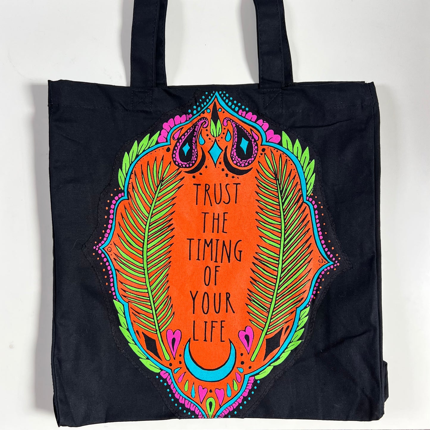 trust the timing of your life tote bag