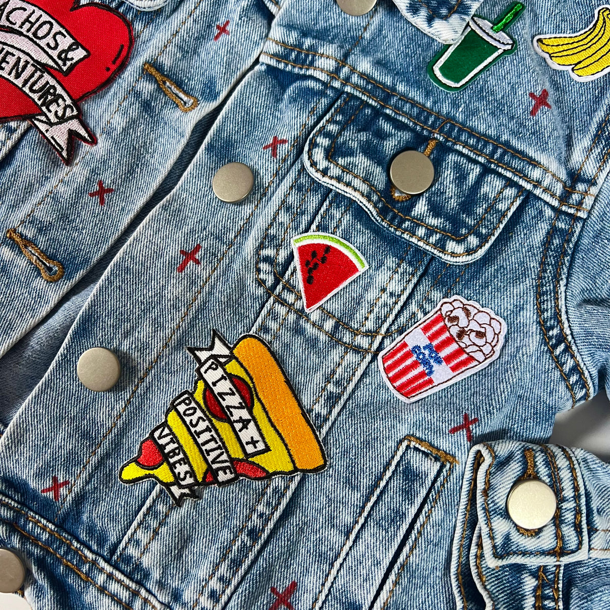 ‘snacks’ kids denim jacket
