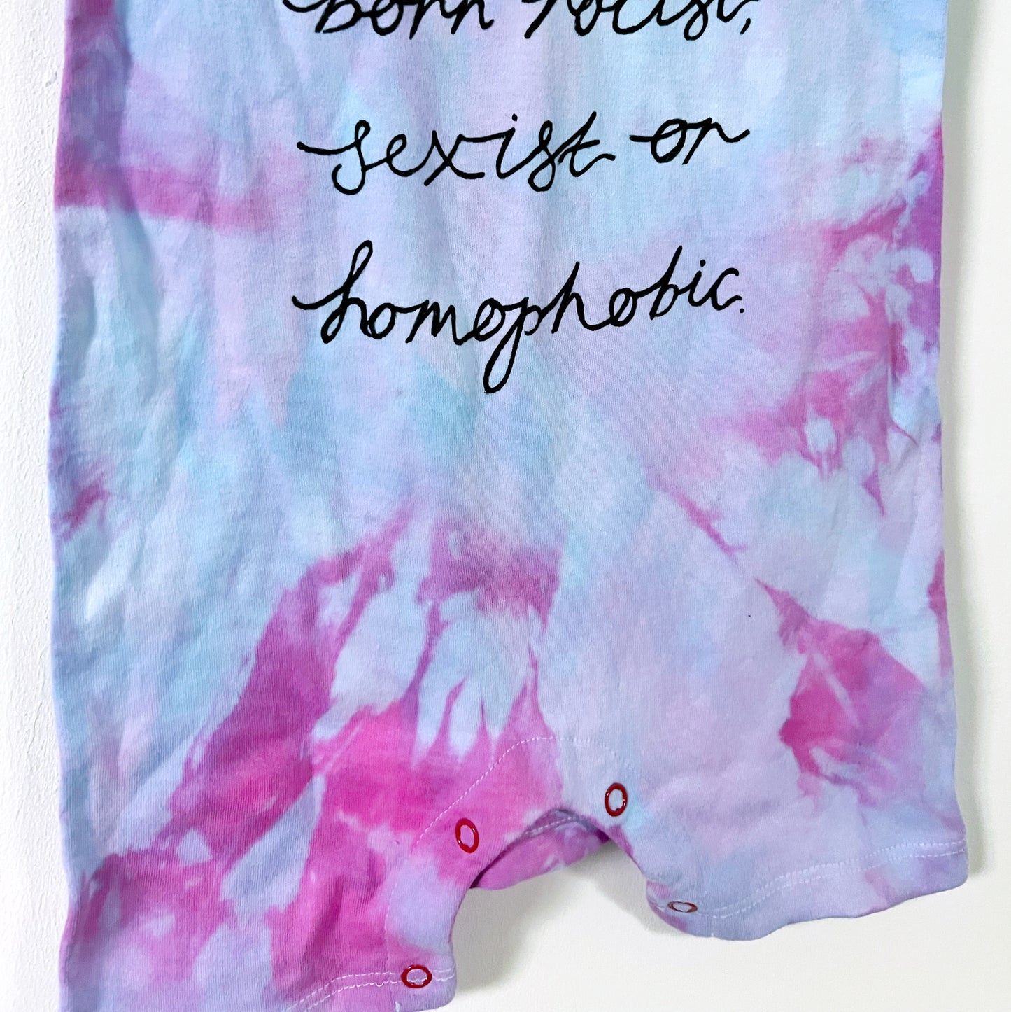 hate is taught tie dye baby bodysuit