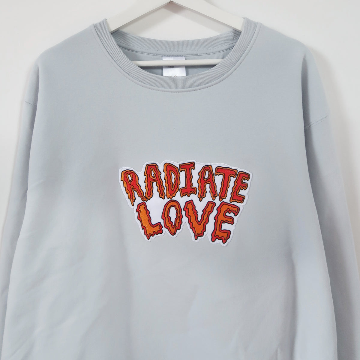radiate love embroidered sweatshirt - lightest blue