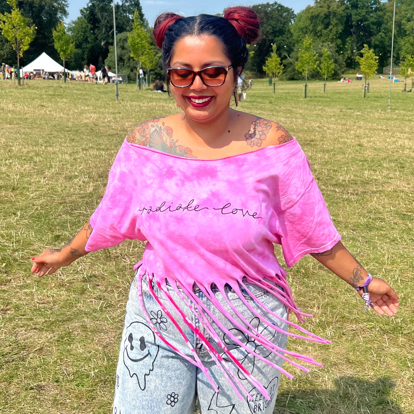 radiate love tie-dye tassel top
