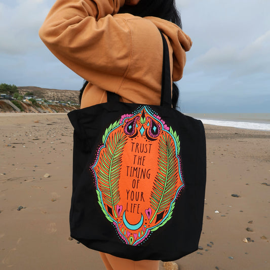 trust the timing of your life tote bag