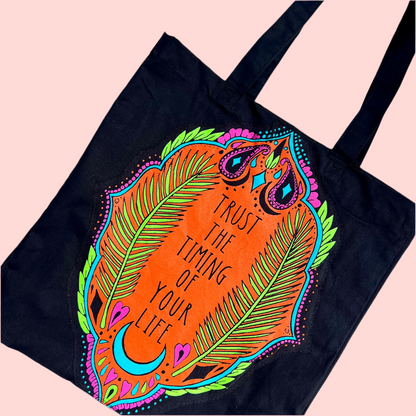 trust the timing of your life tote bag