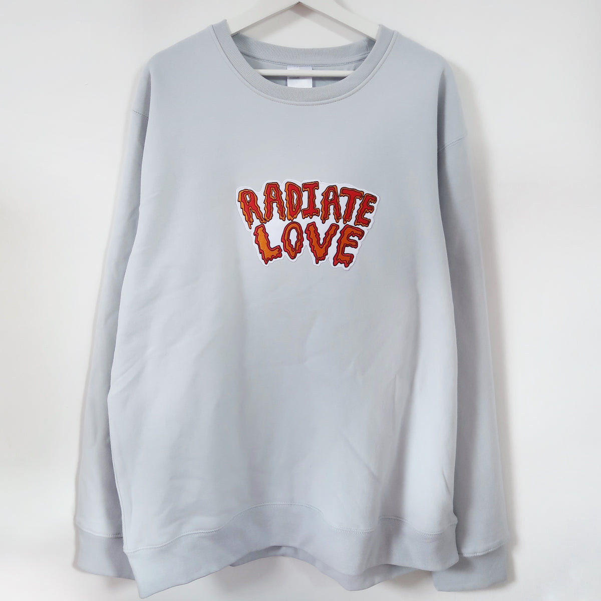 radiate love embroidered sweatshirt - lightest blue