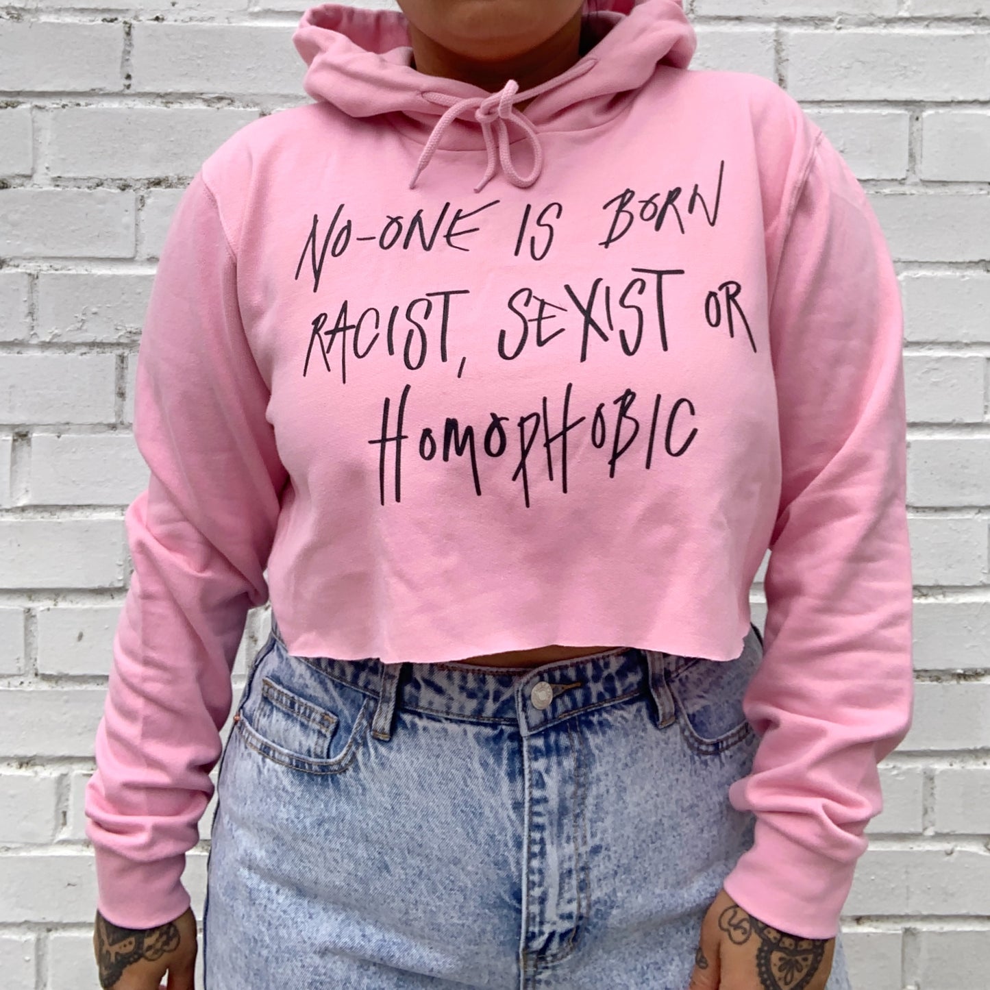 hate is taught cropped hoodie - baby pink