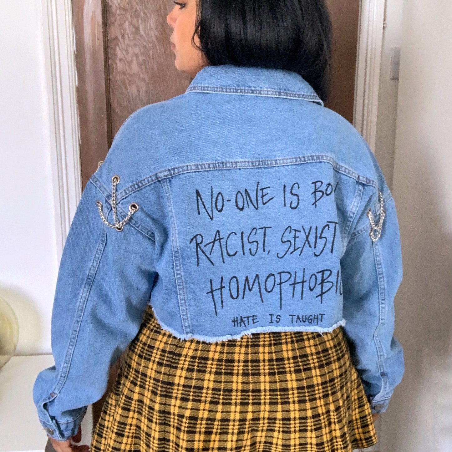 hate is taught denim jacket