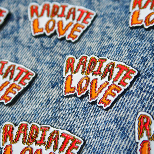 radiate love enamel pin badge