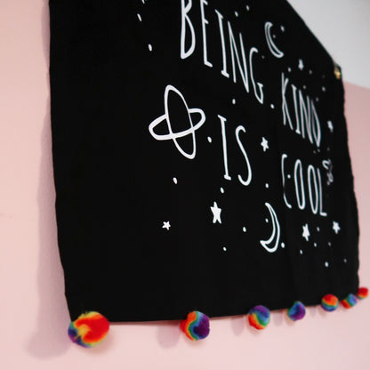 being kind is cool wall hanging - rainbow pom-poms