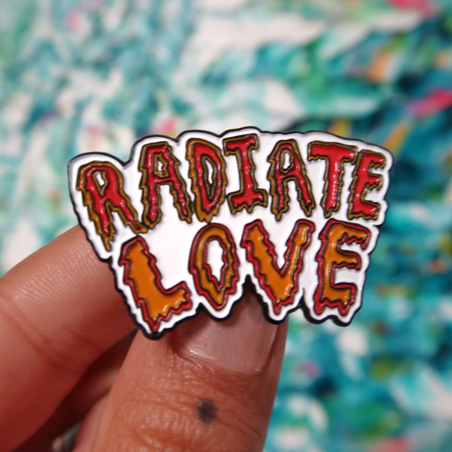 radiate love enamel pin badge